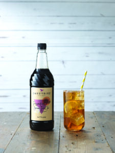Sweetbird Passionfruit Lemon Iced Tea syrup with Iced Tea